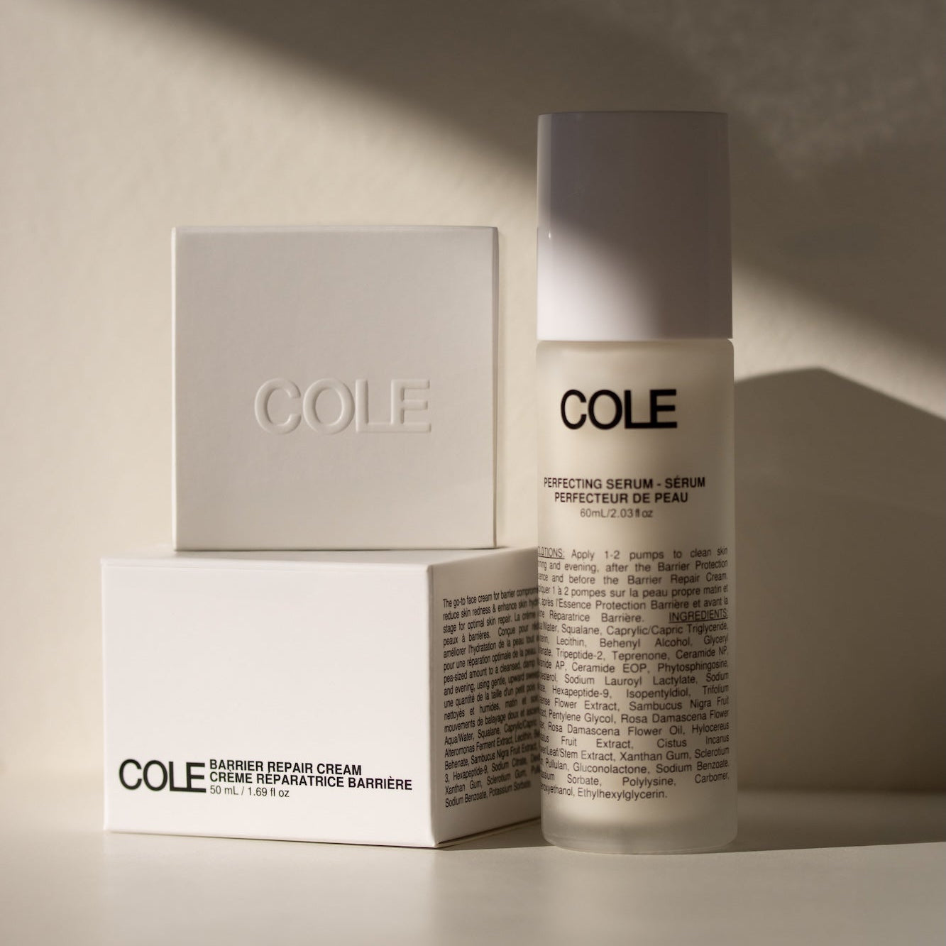 Cole skincare products on a neutral background