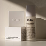 Cole skincare products on a neutral background